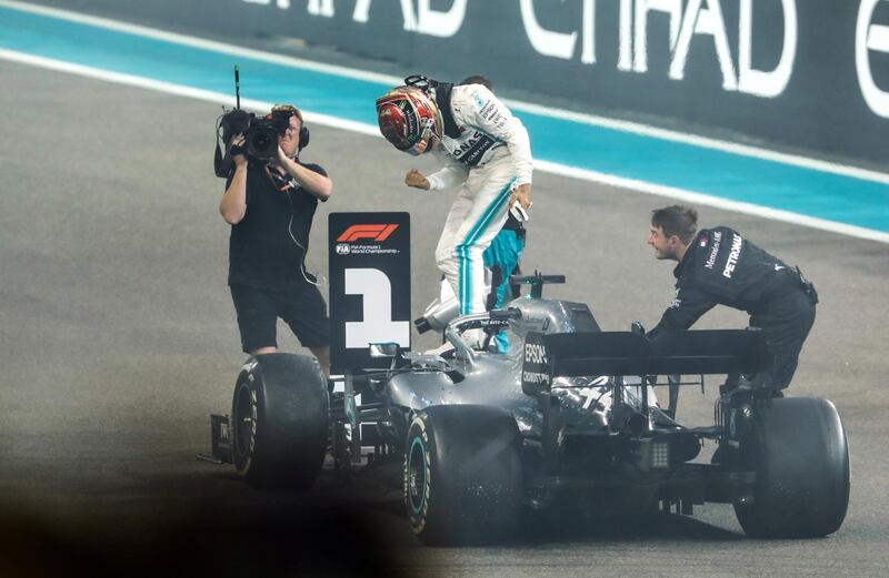 Abu Dhabi, United Arab Emirates, December 1, 2019.  
Formula 1 Etihad Airways Abu Dhabi Grand Prix.
--   Lewis Hamilton (Mercedes)   makes a fist of victory after taking the World Championship Formula1 title.
Victor Besa / The National
Section:  SP
Reporter:  Simon Wilgress-Pipe