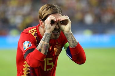 Sergio Ramos celebrates after scoring Spain's first goal in their 2-1 over Romania on Thursday. Reuters