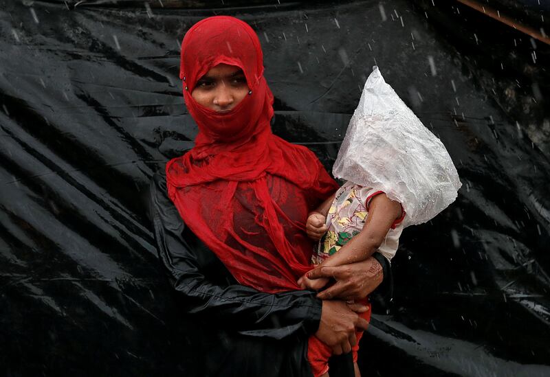 A Rohingya refugee waits in a camp in Cox's Bazar, Bangladesh. Cathal McNaughton / Reuters