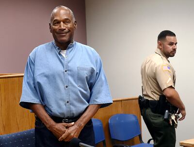 OJ Simpson enters his parole hearing at Lovelock Correctional Center. AP photo