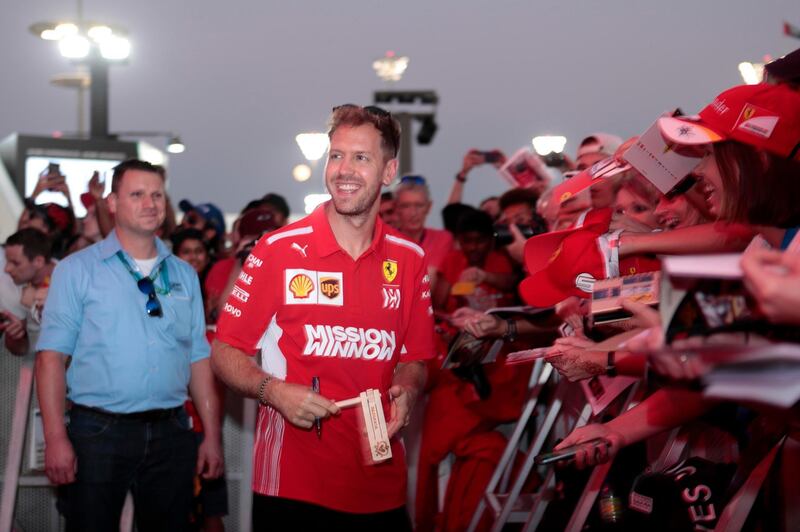 Sebastian Vettel greet his fans during an exclusive autograph signing session at Yas Marina Circuit. Courtesy Yas Marina Circuit