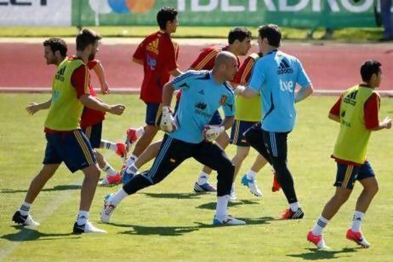 Missing from the Spanish European and world champions' squad are the injured David Villa and Carles Puyol. Javier Lizon / EPA