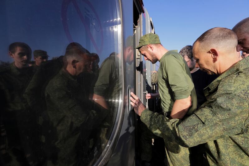 Russian recruits at a station in Prudboi, Russia. They are being told sanitary products are a cost-effective solution to a lack of first aid kits, says the UK. AP