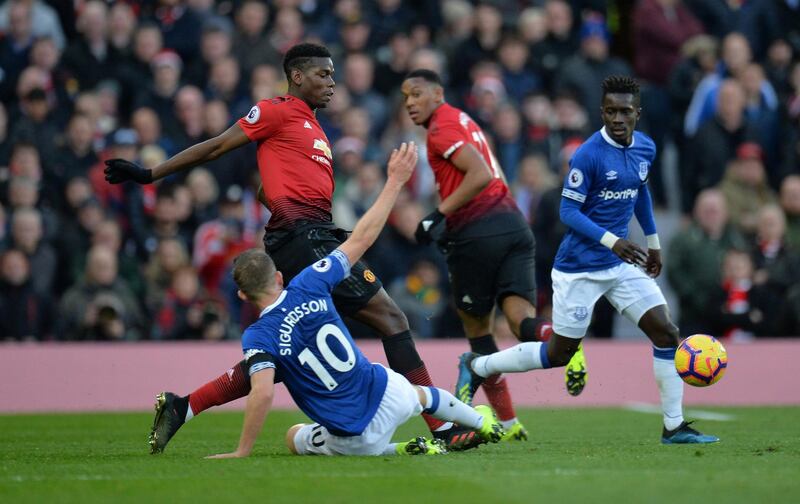 Everton's Gylfi Sigurdsson in action with Pogba. Reuters