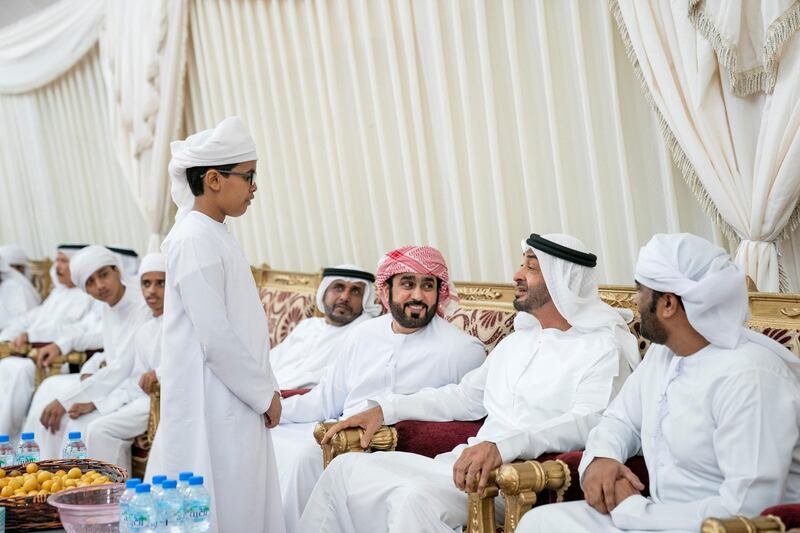 SHAWAMEKH, ABU DHABI, UNITED ARAB EMIRATES - September 15, 2019: HH Sheikh Mohamed bin Zayed Al Nahyan, Crown Prince of Abu Dhabi and Deputy Supreme Commander of the UAE Armed Forces (2nd R), offers condolences to the family of martyr Warrant Officer Zayed Musllam Suhail Al Amri.

( Mohamed Al Hammadi / Ministry of Presidential Affairs )
---