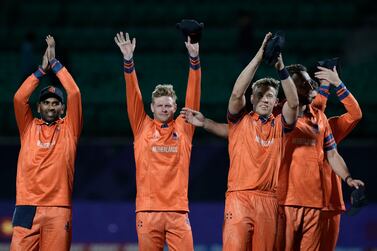 Netherlands players wave at spectators after they beat South Africa during the ICC Men's Cricket World Cup in Dharamshala, India, Tuesday, Oct.  17, 2023.  (AP Photo / Ashwini Bhatia)