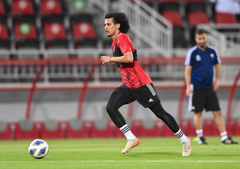 UAE playmaker Omar Abdulrahman trains at the Abdullah bin Khalifa Stadium in Doha ahead of the national team's 2022 World Cup play-off against Australia on Tuesday. Photo: UAE FA