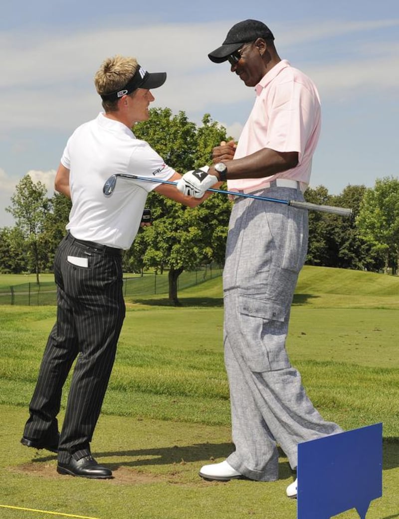 Luke Donald, left, and Michael Jordan have been friends and fierce competitors since 2006. Stan Badz / PGA Tour
