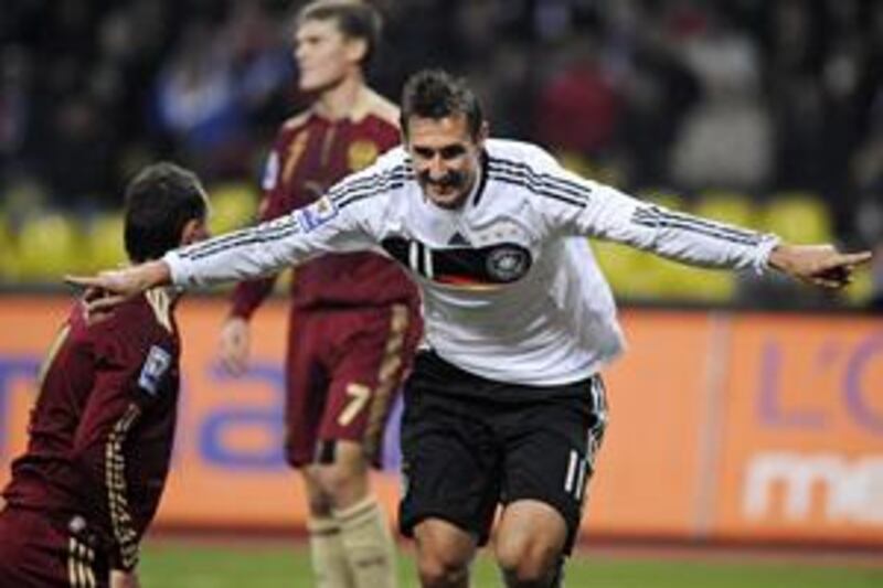 Miroslav Klose celebrates scoring the only goal against Russia at Moscow's Luzhniki Stadium, which put Germany through to the World Cup.