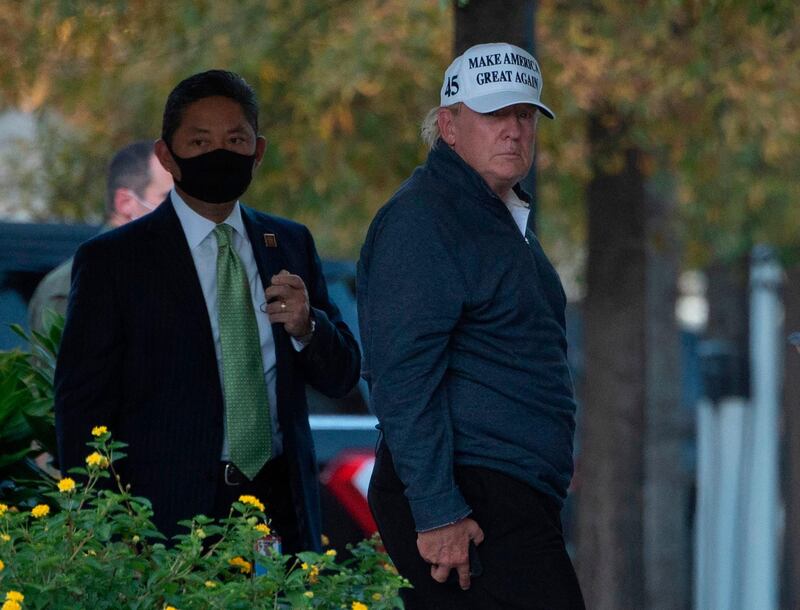 President Donald Trump returns to the White House from playing golf in Washington, after Joe Biden was declared the winner of the 2020 presidential election.  AFP