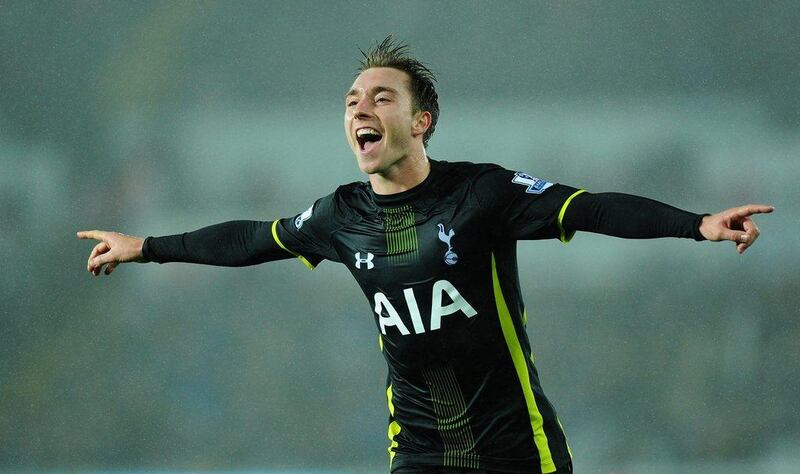 Tottenham's Christian Eriksen celebrates after scoring the winner on Sunday against Swansea City for a 2-1 Premier League victory. Stu Forster / Getty Images / December 14, 2014