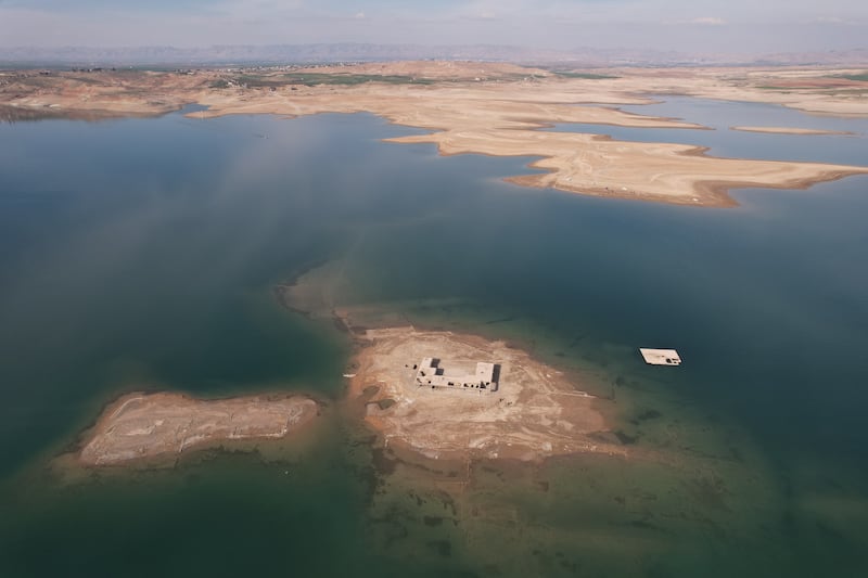 The ruins of Khanki Primary School, submerged about 40 years ago, have appeared after water levels at Iraq's biggest dam fell. All photos: Ismael Adnan for The National