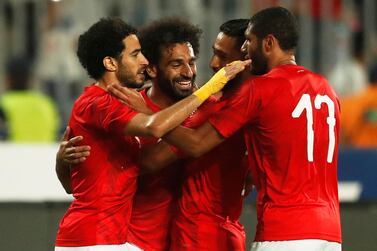 Ahmed Ali Kamel celebrates scoring Egypt's second goal with his teammates. Amr Abdallah Dalsh / Reuters