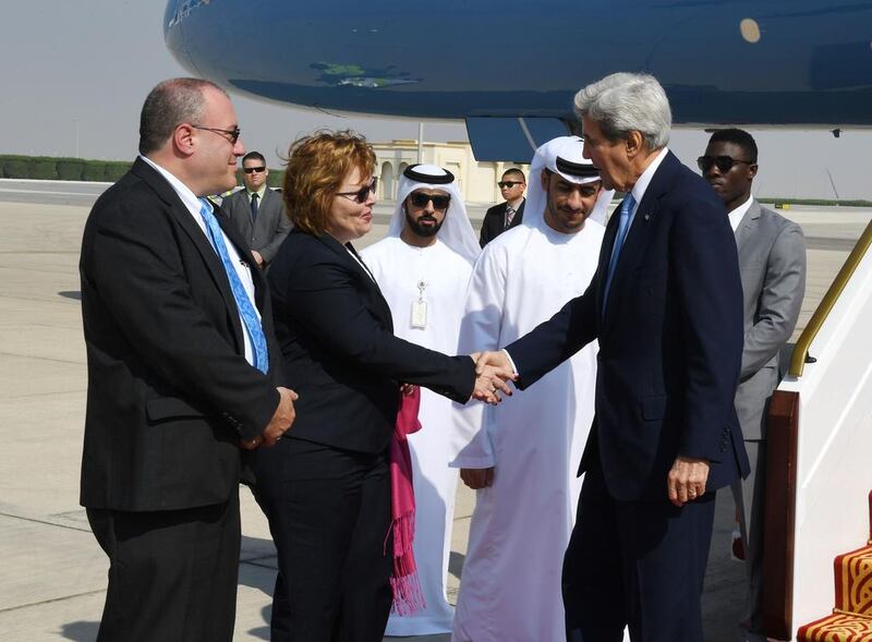 US secretary of state John Kerry greets the US ambassador to the UAE Barbara A Leaf as he arrives in Abu Dhabi on November 15, 2016. / AFP / POOL / Mark RALSTON

