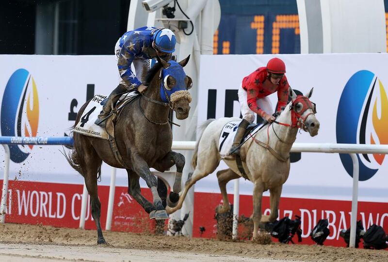 Reda, left, ridden by Harry Bentley rides to victory in the Dubai Kahayla Classic. Pawan Singh / The National