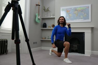 Joe Wicks, aka The Body Coach, vows to be back teaching children PE live via YouTube, after undergoing hand surgery. Getty Images 