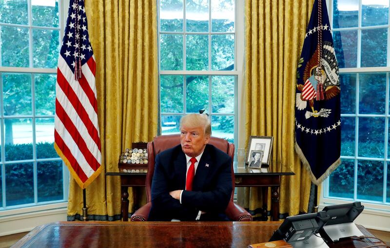 U.S. President Donald Trump reacts to a question during an interview with Reuters in the Oval Office of the White House in Washington, U.S. August 20, 2018.  REUTERS/Leah Millis TPX IMAGES OF THE DAY      TPX IMAGES OF THE DAY