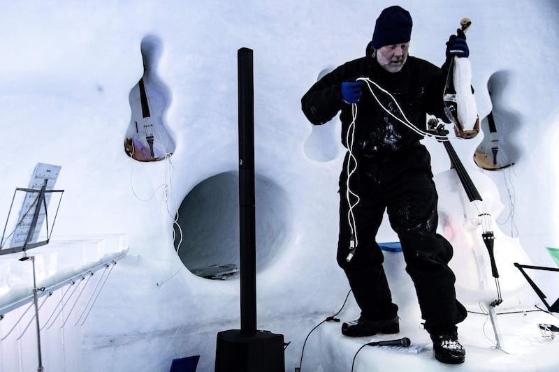 Tim Linhart with an ice violin. AFP