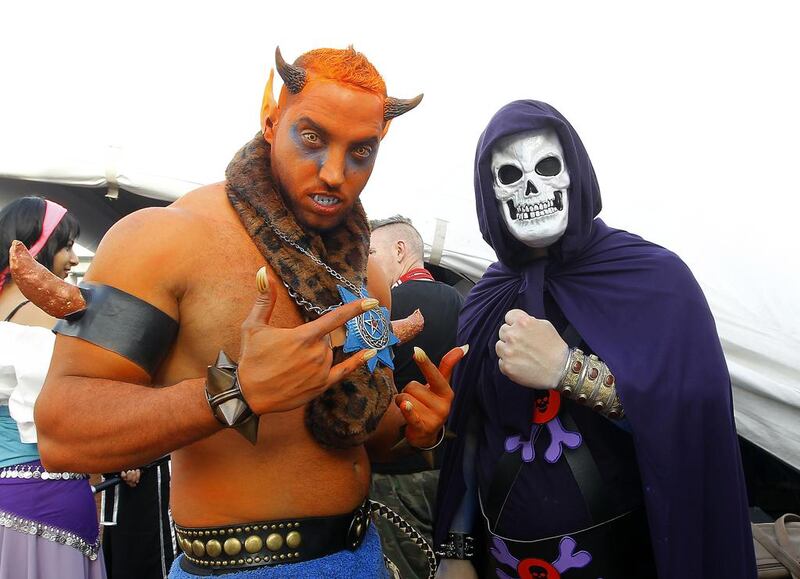 Rafat Anter of the UAE, left, as Beastman and Randolph Costilow of the United States as Skeletor at the Middle East Film and Comic Con in Dubai. Jeffrey E Biteng / The National
