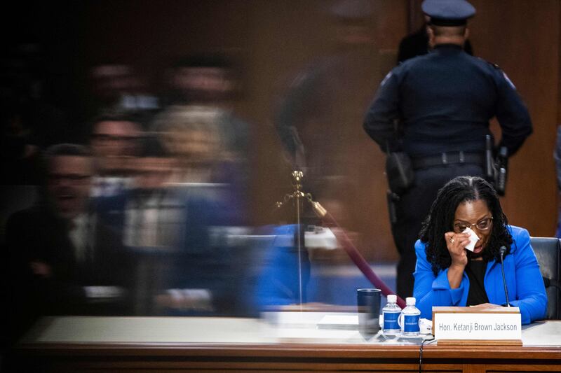 Judge Ketanji Brown Jackson wipes away tears as she appears before the Senate Judiciary Committee on her nomination to be an Associate Justice on the US Supreme Court, in Washington. AFP