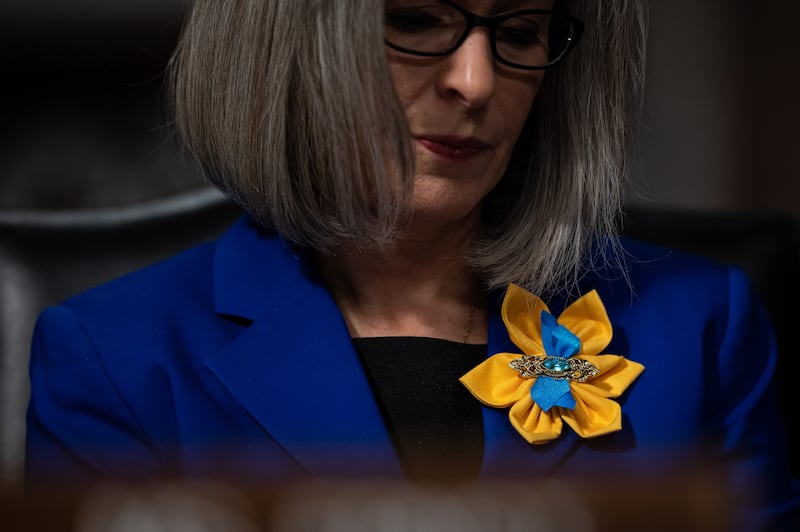 Joni Ernst, a Republican senator from Iowa, wears a brooch in the colours of Ukraine during a Senate Armed Services Committee hearing at the US Capitol. EPA