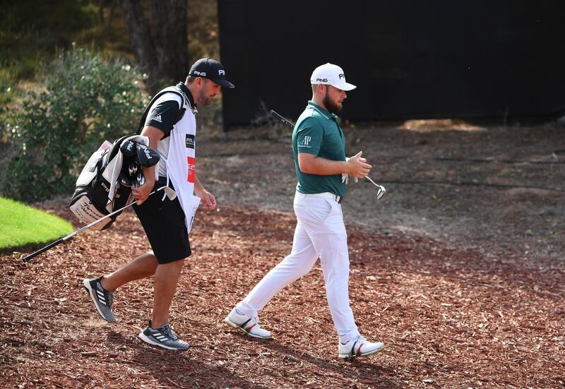 DUBAI, UNITED ARAB EMIRATES - NOVEMBER 16:  Tyrrell Hatton of England and caddie walk off the 4th tee during day two of the DP World Tour Championship at Jumeirah Golf Estates on November 16, 2018 in Dubai, United Arab Emirates.  (Photo by Ross Kinnaird/Getty Images)