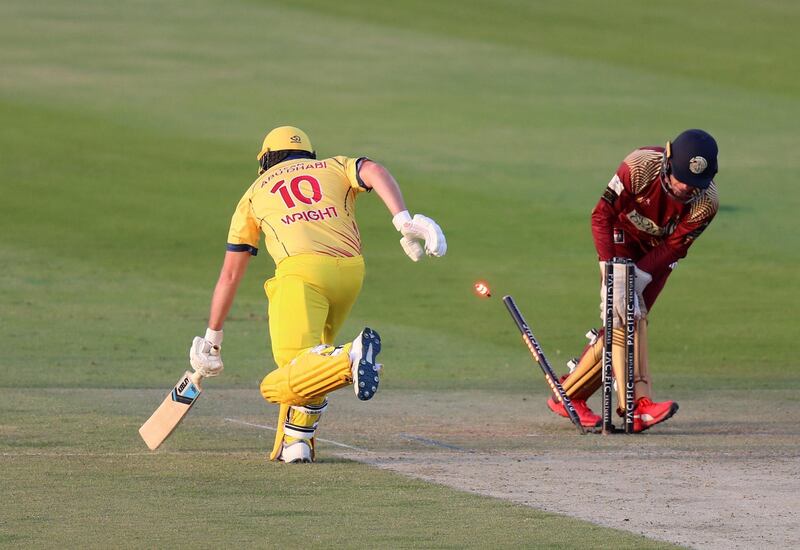 Abu Dhabi, United Arab Emirates - November 17, 2019: Abu Dhabi's Luke Wright is run out during the game between Team Abu Dhabi and The Northern Warriors in the Abu Dhabi T10 league. Sunday the 17th of November 2019. Zayed Cricket Stadium, Abu Dhabi. Chris Whiteoak / The National