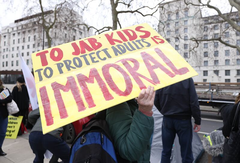 Anti-vaccination protesters demonstrate outside Downing Street against Covid-19 inoculations for children. PA