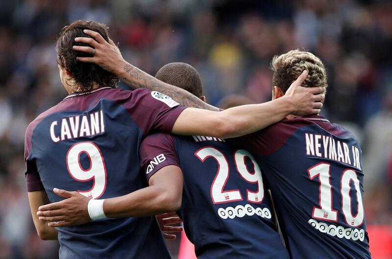 Soccer Football - Ligue 1 - Paris St Germain vs Bordeaux - Parc des Princes, Paris, France - September 30, 2017  Paris Saint-Germain’s Kylian Mbappe celebrates scoring their sixth goal with Neymar and Edinson Cavani    REUTERS/Benoit Tessier