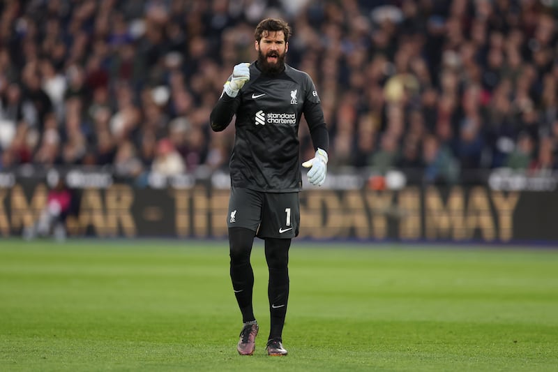 LIVERPOOL RATINGS: Alisson - 7. A degree of misfortune came with West Ham’s opening goal, as Lucas Paqueta’s well-hit effort deflected off the knee of Virgil van Dijk, changing the trajectory of the ball to leave the Brazilian stranded. Tackled Danny Ings to prevent what might have been a big chance. Getty 
