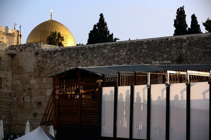 Visitors wait to enter and visit the compound known to Muslims as Noble Sanctuary and to Jews as Temple Mount, in Jerusalem's Old City, earlier this month. Reuters