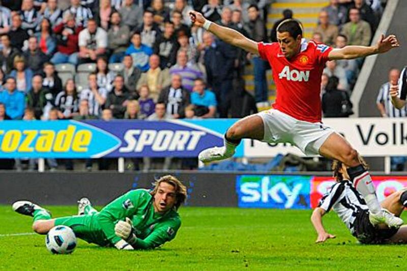 Newcastle United’s goalkeeper Tim Krul prevents Javier Hernandez from scoring in the first half at St James’ Park last night.