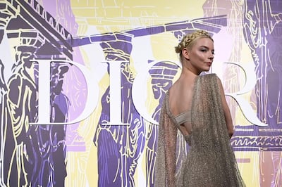 American-born Argentine-British actress and model Anya Taylor-Joy poses during the photocall before the 2022 Dior Croisiere (Cruise) fashion show, at the Panathenaic Stadium, in Athens, on June 17, 2021. / AFP / ARIS MESSINIS
