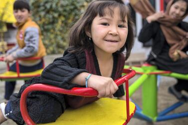 Children play at the mobile mini circus in Kabul, an initiative that has helped street-working children find a safe place. Stefanie Glinski for The National