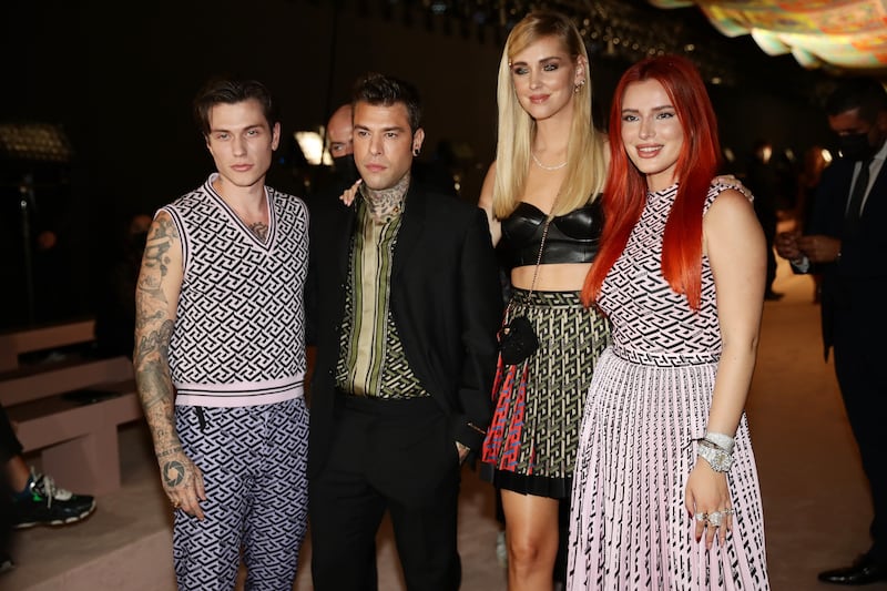 Benjamin Mascolo, Fedez, Chiara Ferragni and Bella Thorne are seen on the front row of the Versace fashion show during Milan Fashion Week. Getty Images