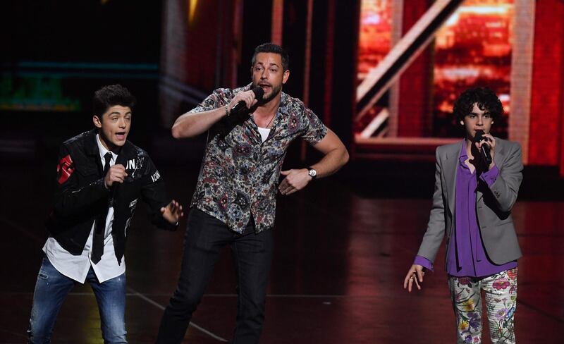 From left, actor Asher Angel, Zachary Levi and Jack Dylan Grazer appear on stage. AFP