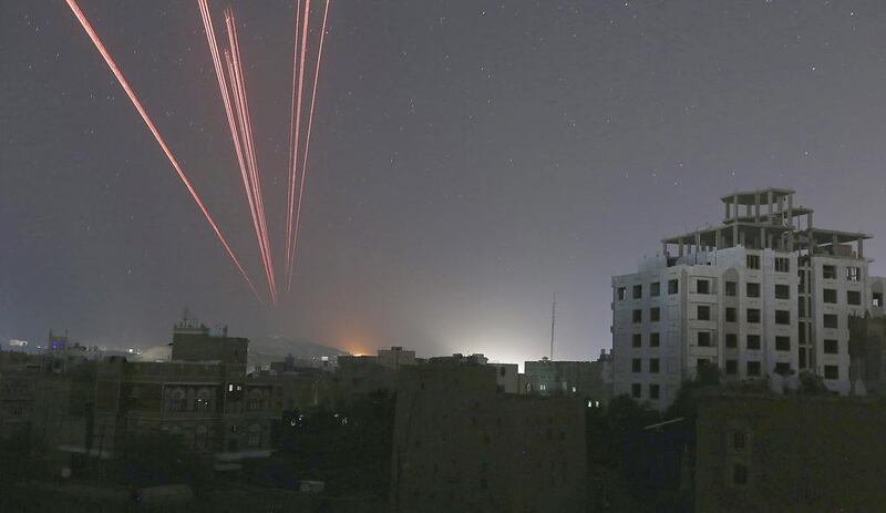 The sky over a Sanaa neighborhood is illuminated by anti-aircraft fire as the Saudi Arabia-led coalition intensifies airstrikes on Houthi positions in Yemen's capital on September 21. EPA