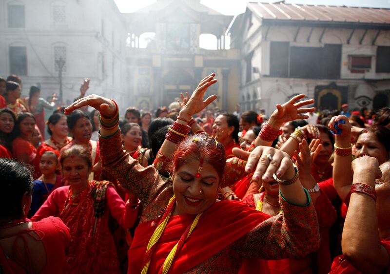 Women sing and dance at Pashupatinath Temple during the Teej festival in Kathmandu, Nepal. Navesh Chitrakar / Reuters