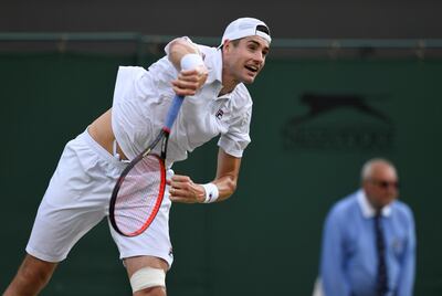 Tennis - Wimbledon - All England Lawn Tennis and Croquet Club, London, Britain - July 9, 2018  John Isner of the U.S. in action during the fourth round match against Greece's Stefanos Tsitsipas   REUTERS/Tony O'Brien