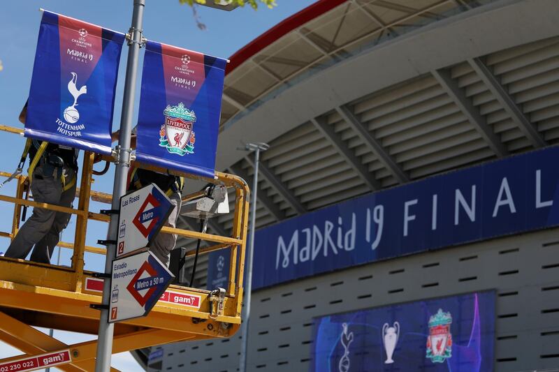 Soccer Football - Champions League Final - Preview - Wanda Metropolitano, Madrid, Spain - May 28, 2019   General view of signage of Liverpool and Tottenham Hotspur crests being erected outside the stadium    REUTERS/Sergio Perez