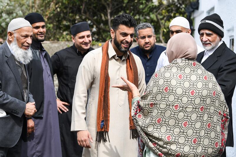 Aihtsham Rashid, centre, and members of the Muslim community attend the opening of the first mosque built on the Western Isles, Stornoway, Scotland, on May 11, 2018. Jeff J Mitchell / Getty Images