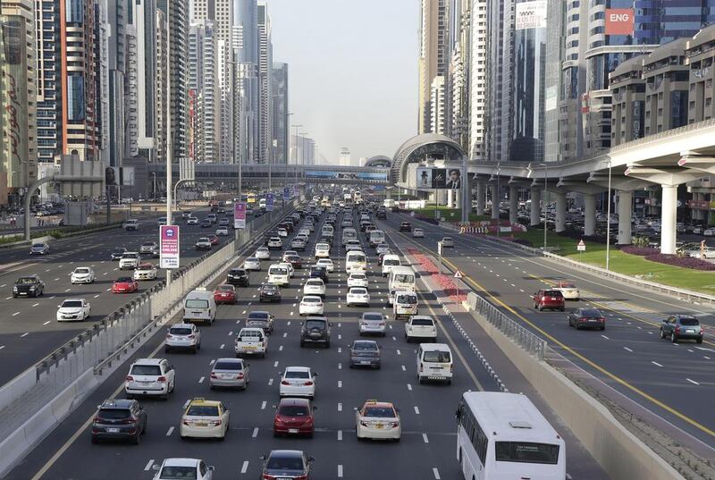 Traffic builds up on the Sheikh Zayed Road, the main commuter road between Abu Dhabi and Dubai. Jeffrey E Biteng / The National