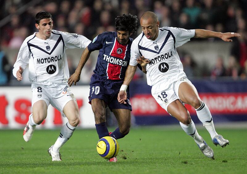 Vikash Dhorasoo, centre, vies with Bordeaux midfielders Alejandro Alonso, left, and Julien Faubert while playing for Paris Saint-Germain at the Parc des Prince in 2006. Born to Indo-Mauritian parents originally hailing from Andhra Pradesh, Dhorasoo earned 18 caps for France and was part of the team that finished runners-up at the 2006 World Cup. AFP