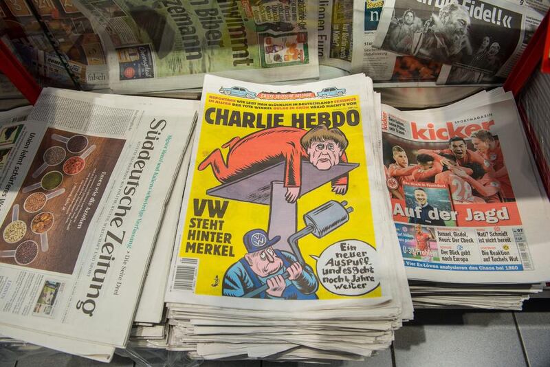 The German edition of Charlie Hebdo on sale at a bookstore at the main station in Frankfurt am Main, Germany, 1 December 2016. The first German-language edition of the French satirical magazine Charlie Hebdo is on sale in Germany.  Andreas Arnold / EPA 