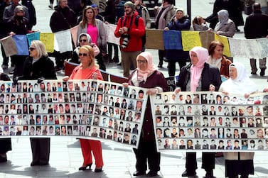 Women from Srebrenica take part in a peaceful demonstration in front of the 'Heart of Jesus' Cathedral in Sarajevo, Bosnia and Herzegovina, 11 April 2022, in memory of 11 July 1995.  More than 8,000 Muslim men and boys were executed in the 1995 killing spree after Bosnian Serb forces overran the town of Srebrenica.  The protests will take place every 11th of the month in another city in BiH, recalling the genocide that took place in Srebrenica.   EPA / FEHIM DEMIR