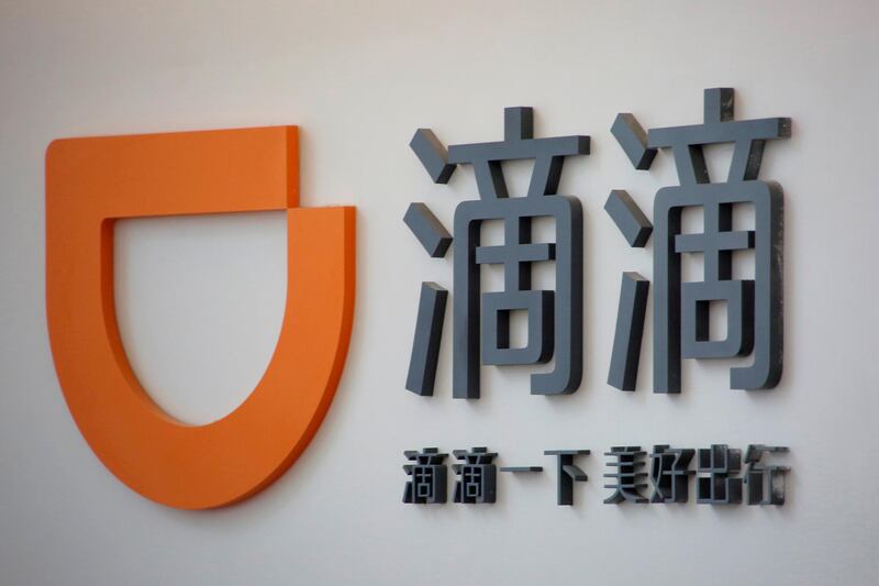 FILE PHOTO: The logo of Didi Chuxing is seen at its headquarters in Beijing, China, May 18, 2016. REUTERS/Kim Kyung-Hoon/File Photo