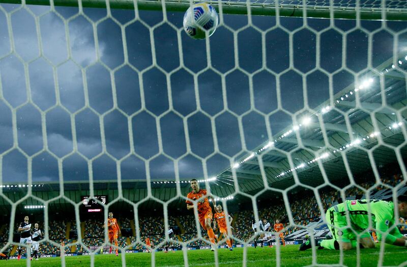 Juventus' Cristiano Ronaldo scores their first goal from the penalty spot. Reuters