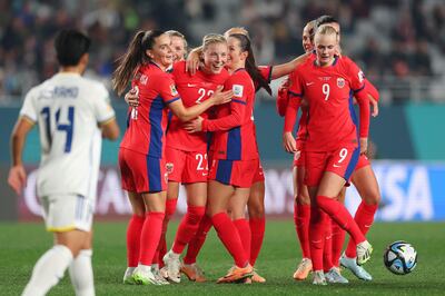 Sophie Roman Haug of Norway celebrates with team-mates after scoring her side's sixth goal against the Philippines at Eden Park. Getty