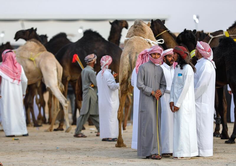 Abu Dhabi, United Arab Emirates, December 11,2019.    -- Visitors and participants at the Al Dhafra Camel Festival 2019.Victor Besa/The NationalSection:  NAReporter:  Anna Zacharias