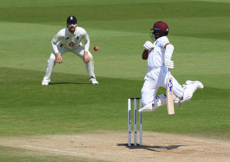 West Indies' Shane Dowrich, right, leaps in the air in an attempt to play a ball from England's Jofra Archer. AP